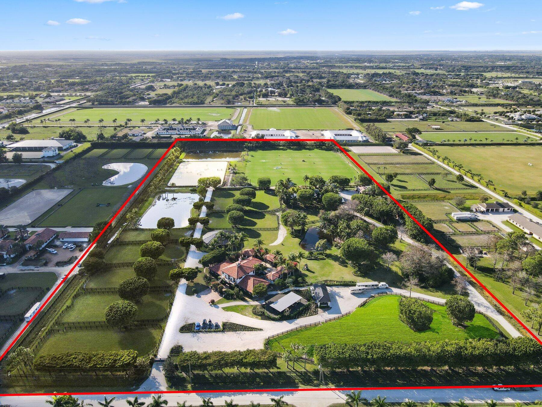 Stunning 21 acre Equestrian Compound located in the heart of Wellington close to all world class horse show and polo venues.