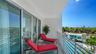Large (virtually staged) front porch/lanai for sunset gazing and enjoymeny