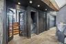 From garage, wood doors create a seamless hallway,