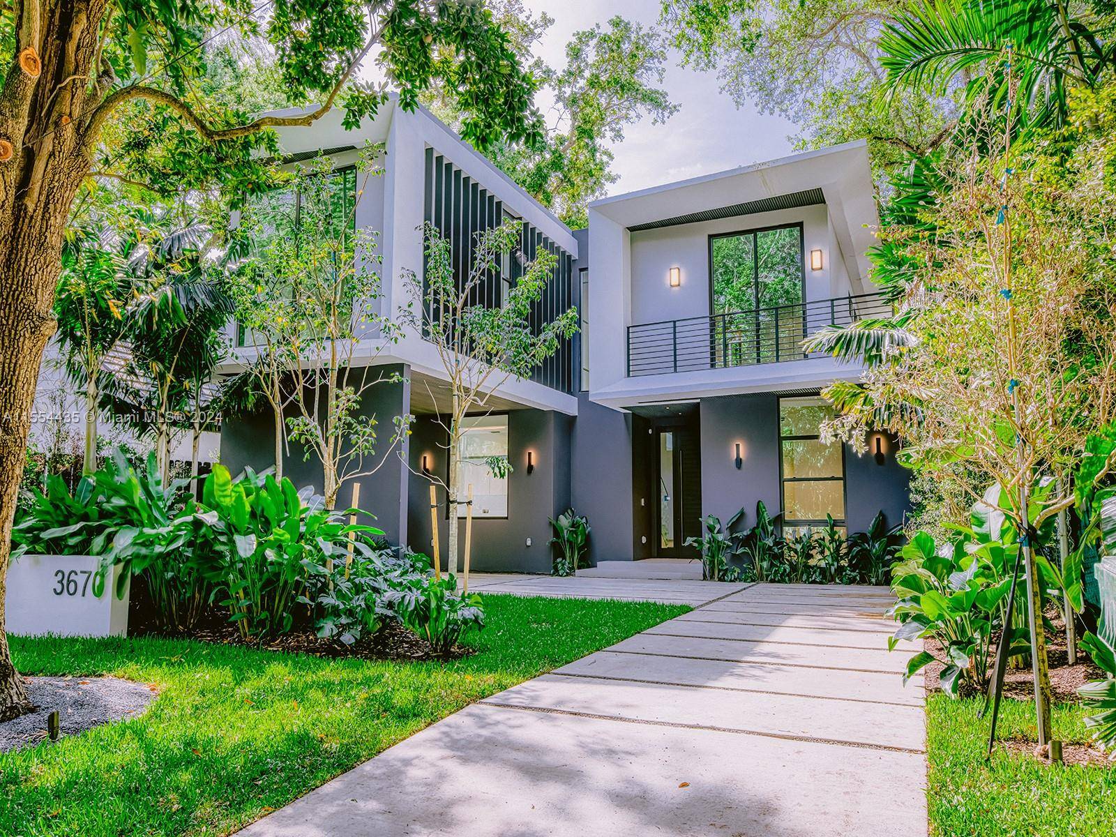 Nestled in the vibrant Coconut Grove neighborhood of Miami, this home offers a quintessential blend of modern luxury and tropical charm.