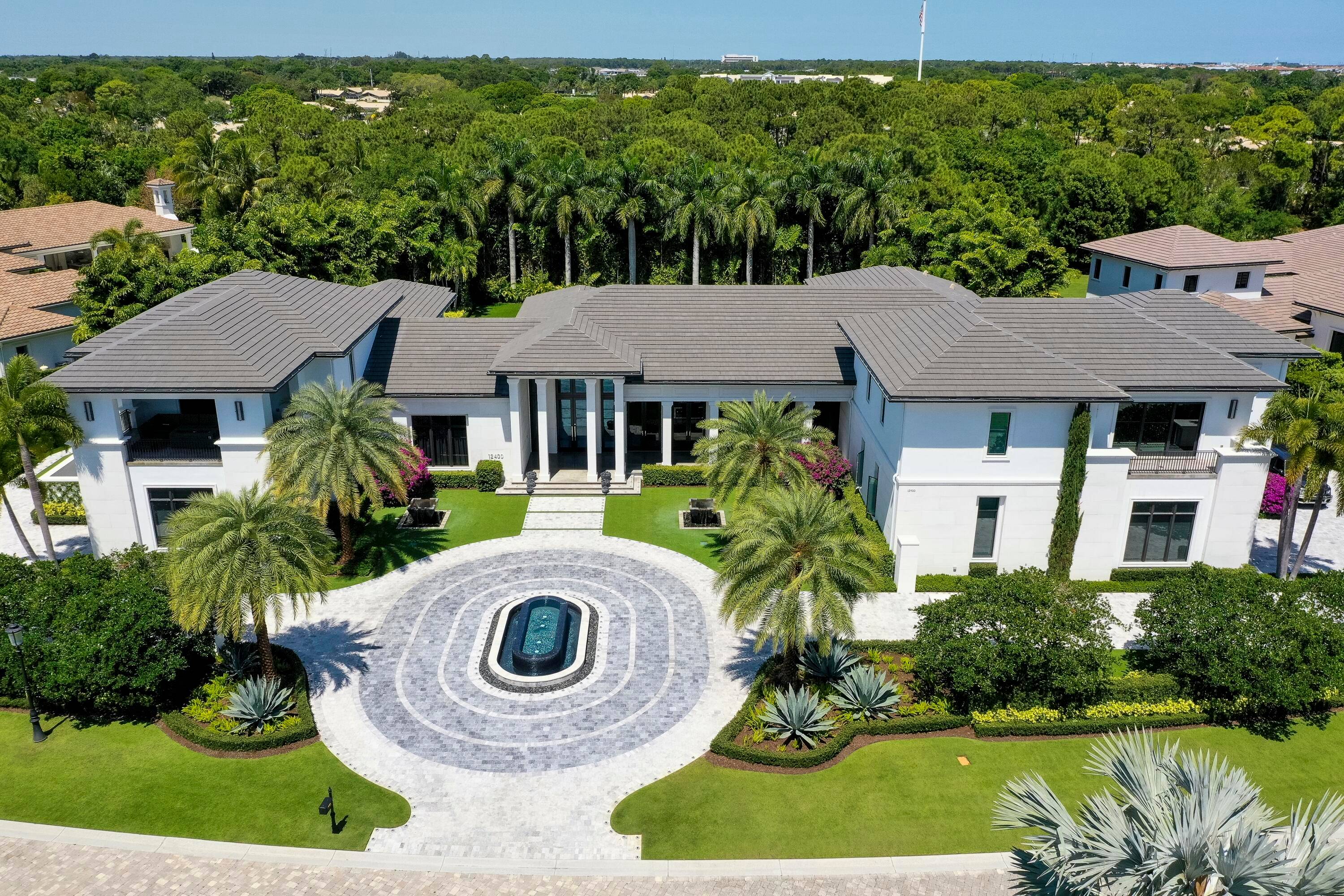 FORTEZZA. Boasting world class displays securities to display the most valuable collections, this bold yet exquisite mansion in Old Palm is now available for your consideration.