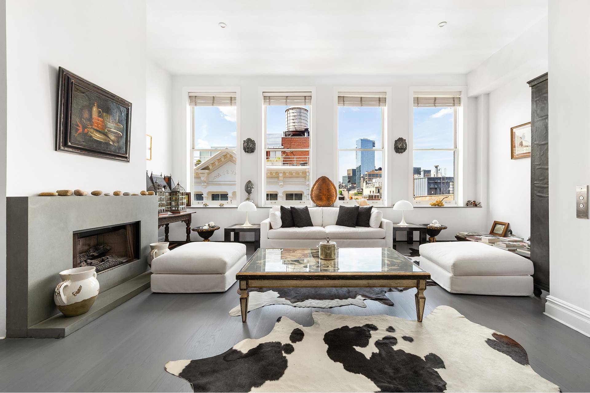 Welcome to the epitome of luxurious loft living at 48 Mercer Street, Unit 6W.