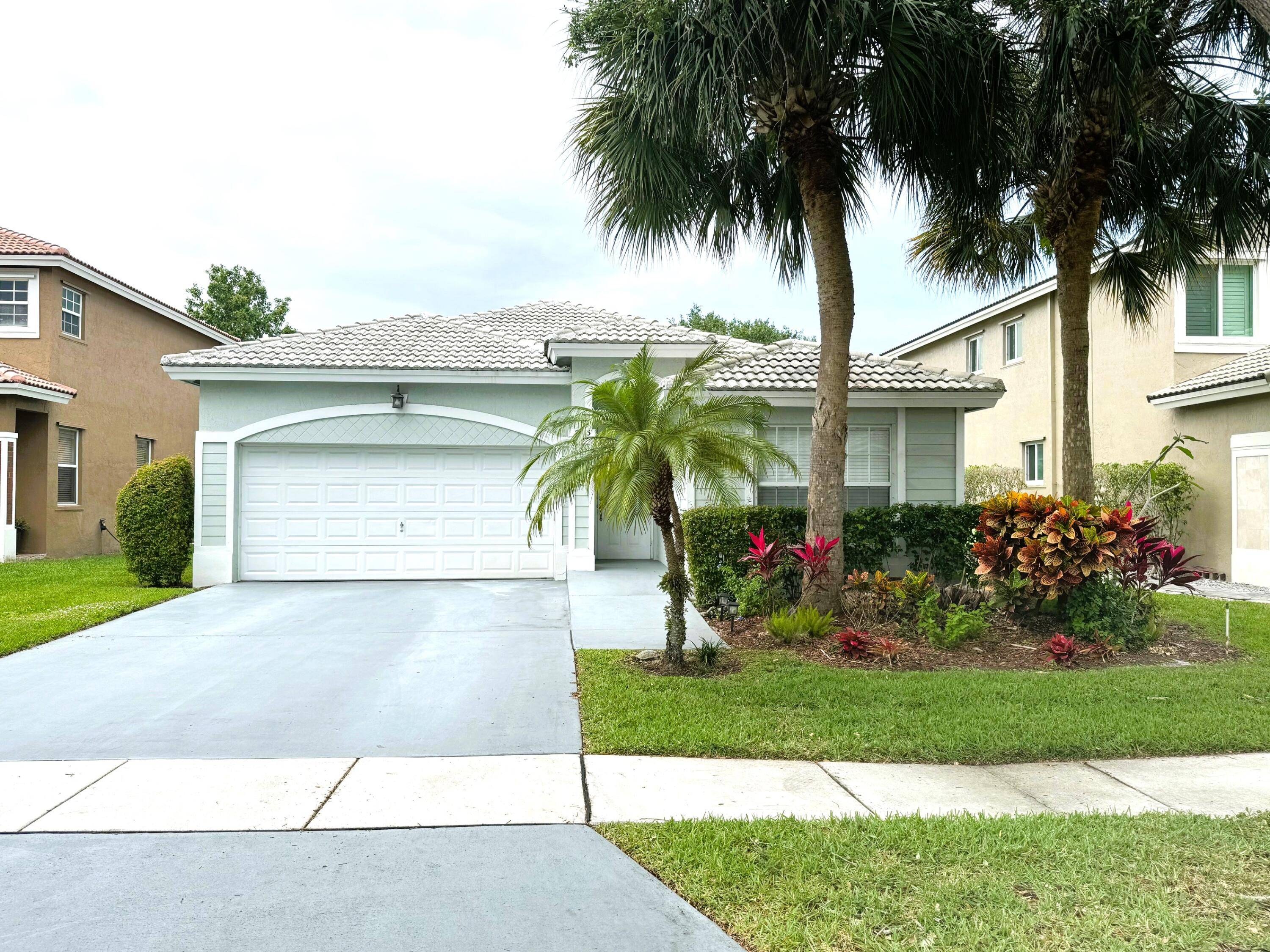 Prestigious Parkland Area Popular Gated Community Beautiful Pool Home 3 Bedrooms 2 Baths Fenced Backyard 2 Car Garage Upgraded Kitchen 42'' Wood Cabinets Granite Tops Center Island with Drawers Stainless ...