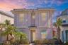 Coastal inspired Margaritaville cottage in Kissimmee Florida near Disney with vibrant exterior and prime resort location