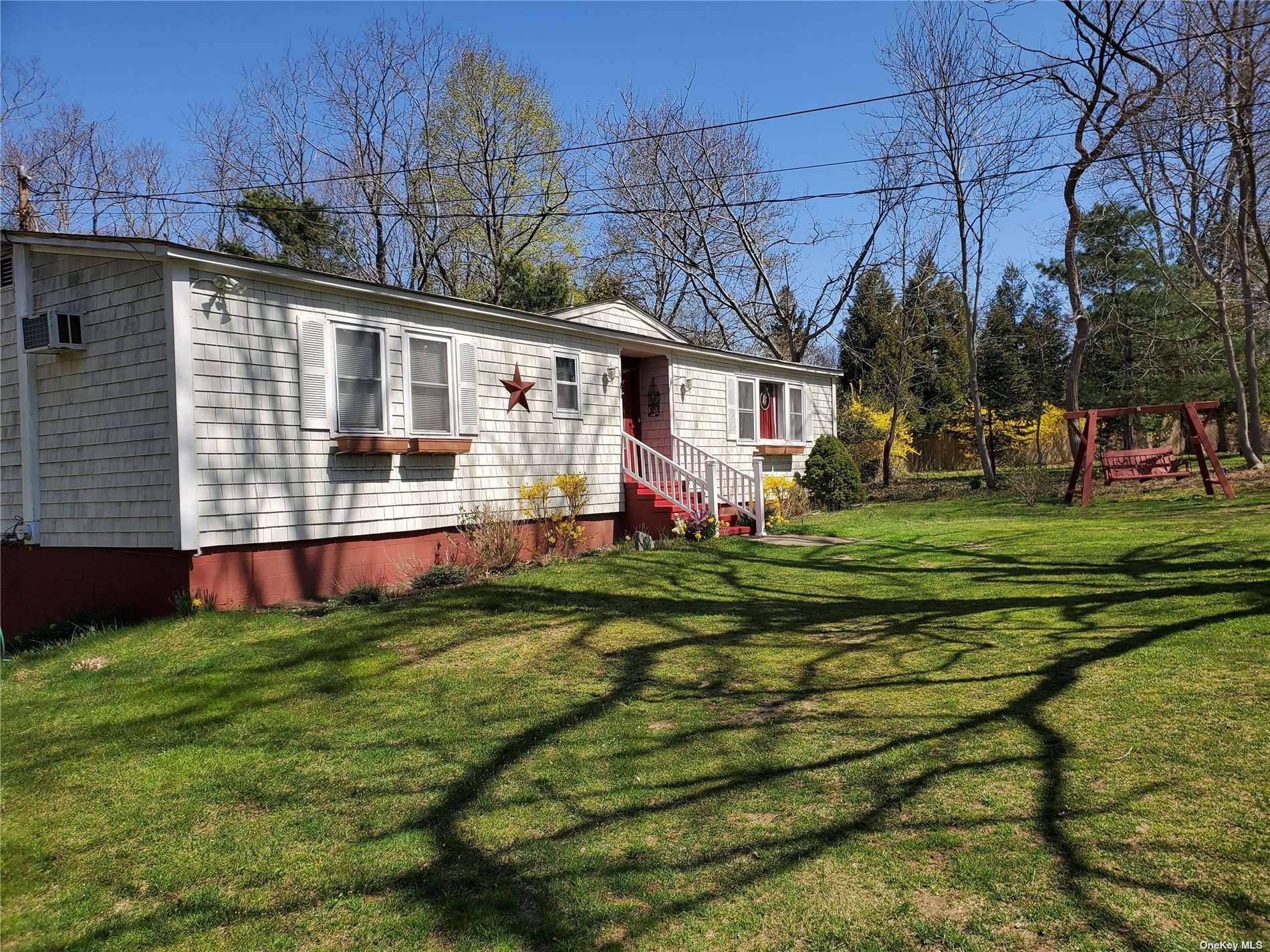 Cozy 2 bedroom, 2 bath ranch style home with utopic back yard.