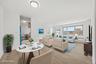 Virtually staged dining and living area