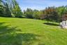 Deck Overlooks Stunning Yard