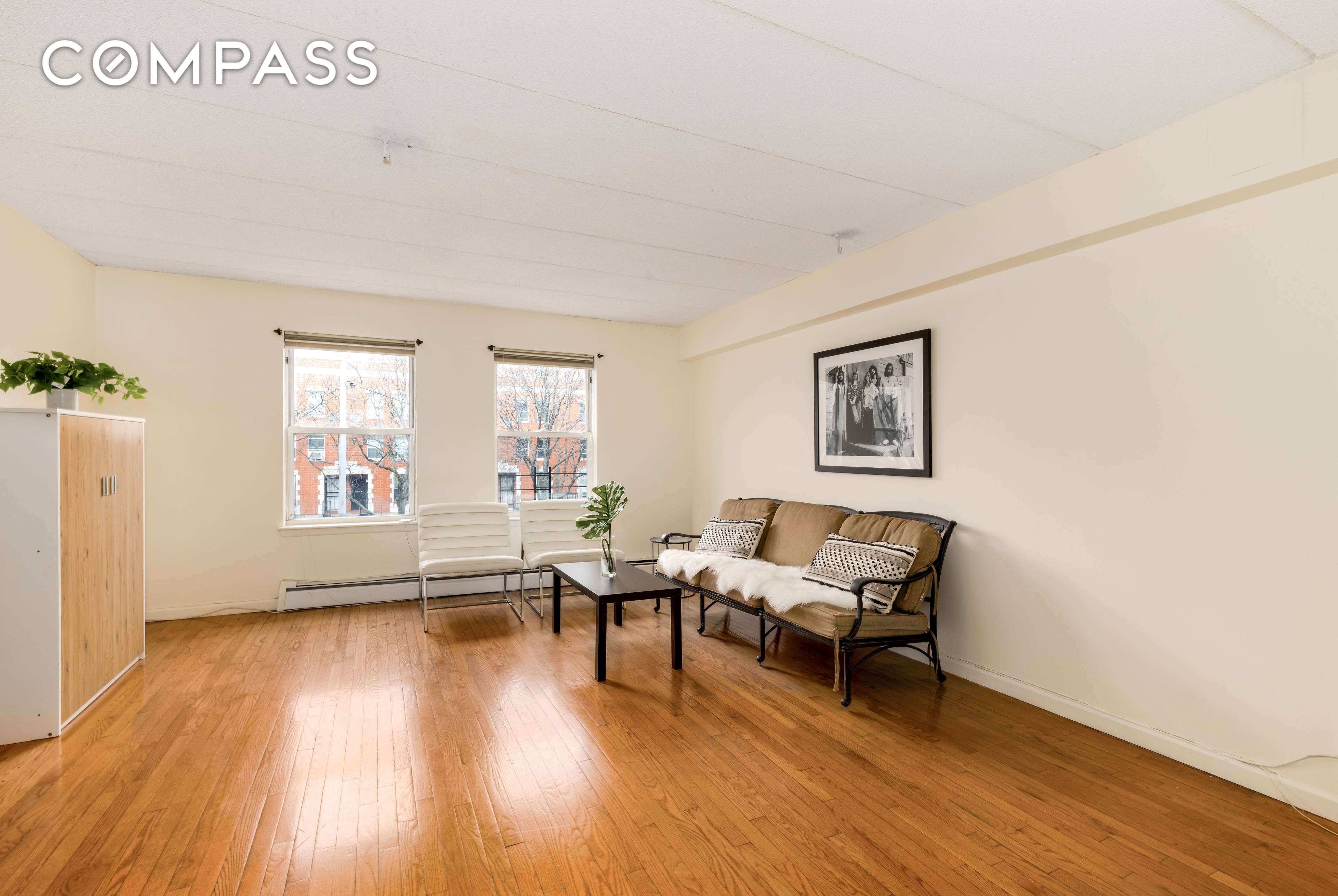Move right into this spacious and bright two bedroom, one and a half bathroom duplex featuring updated interiors and a desirable Central Harlem location.