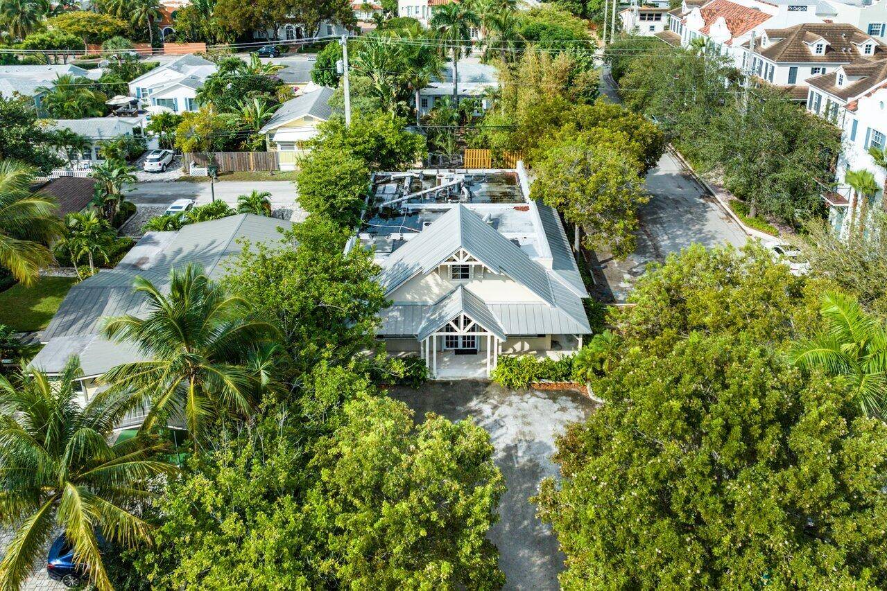 In the heart of Delray Beach, this exceptional commercial property presents an extraordinary blend of strategic location, versatile space, and immense potential to develop a multi use building.