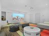 Home theater room featuring recessed lighting and wood finished floors