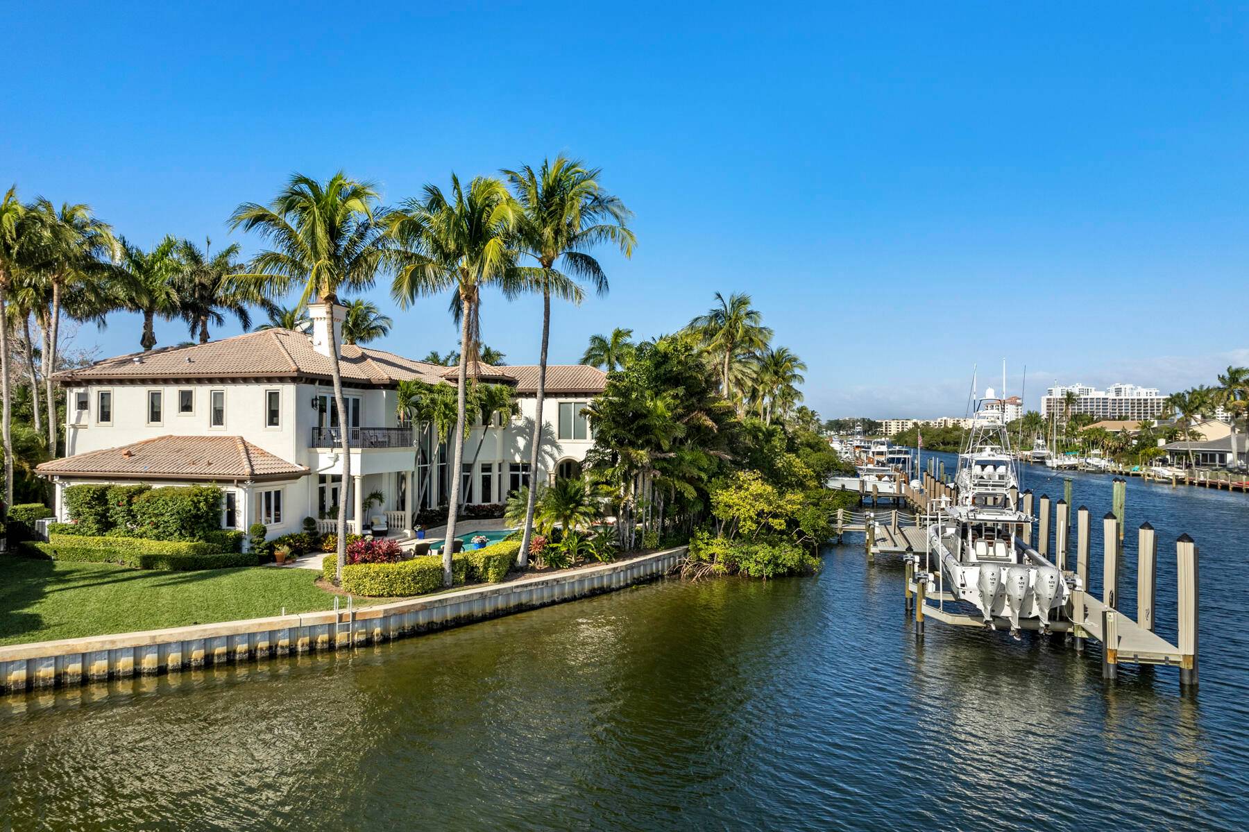 Experience the epitome of luxury living in this exquisite estate, a true boater's paradise nestled in Harbour Isles.