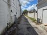 Rear Alley double door entry.