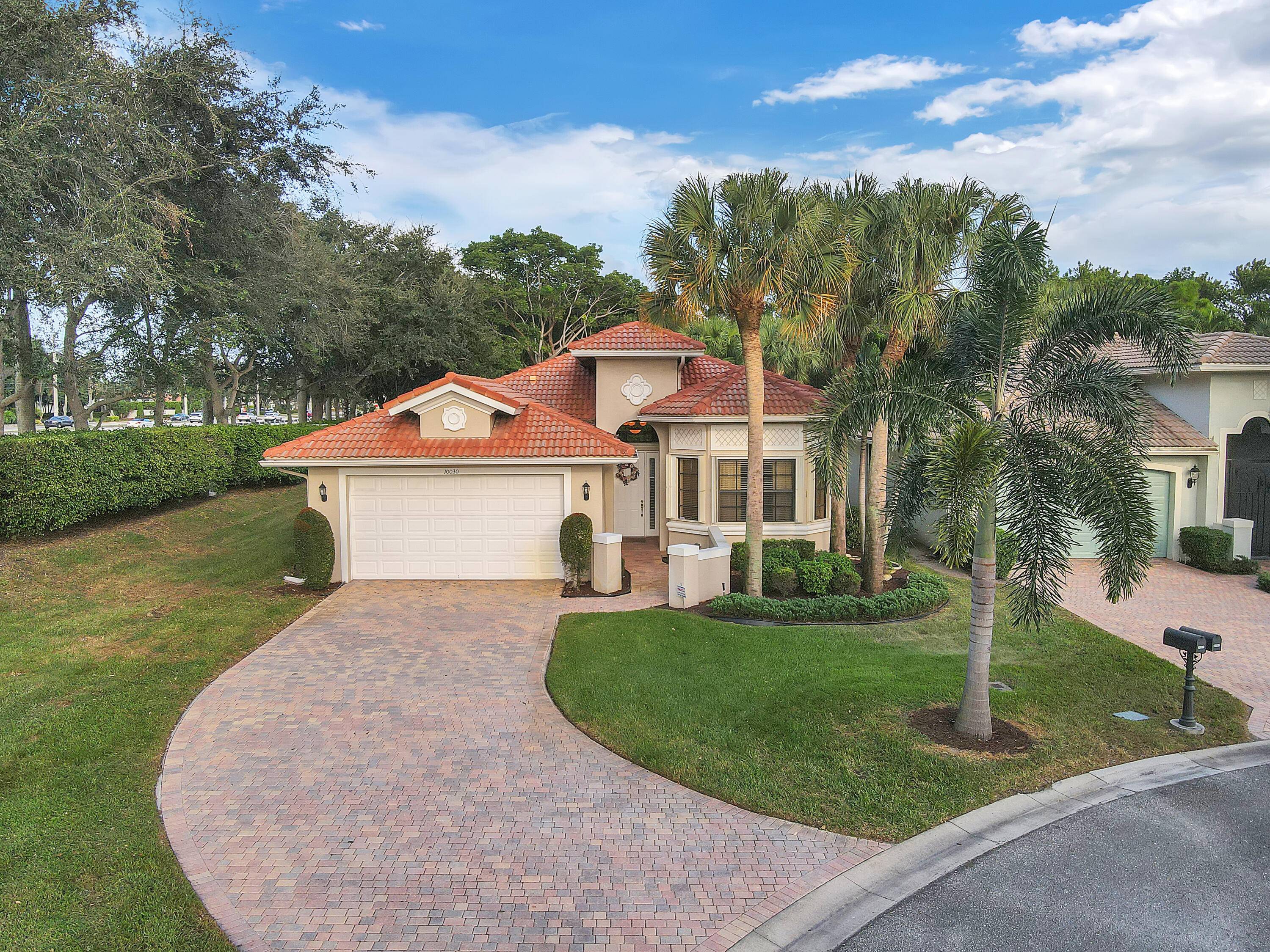 Discover a slice of Florida paradise in this impeccable 3BR, 2BA home located within the elite 55 Tivoli Lakes community in Boynton Beach.