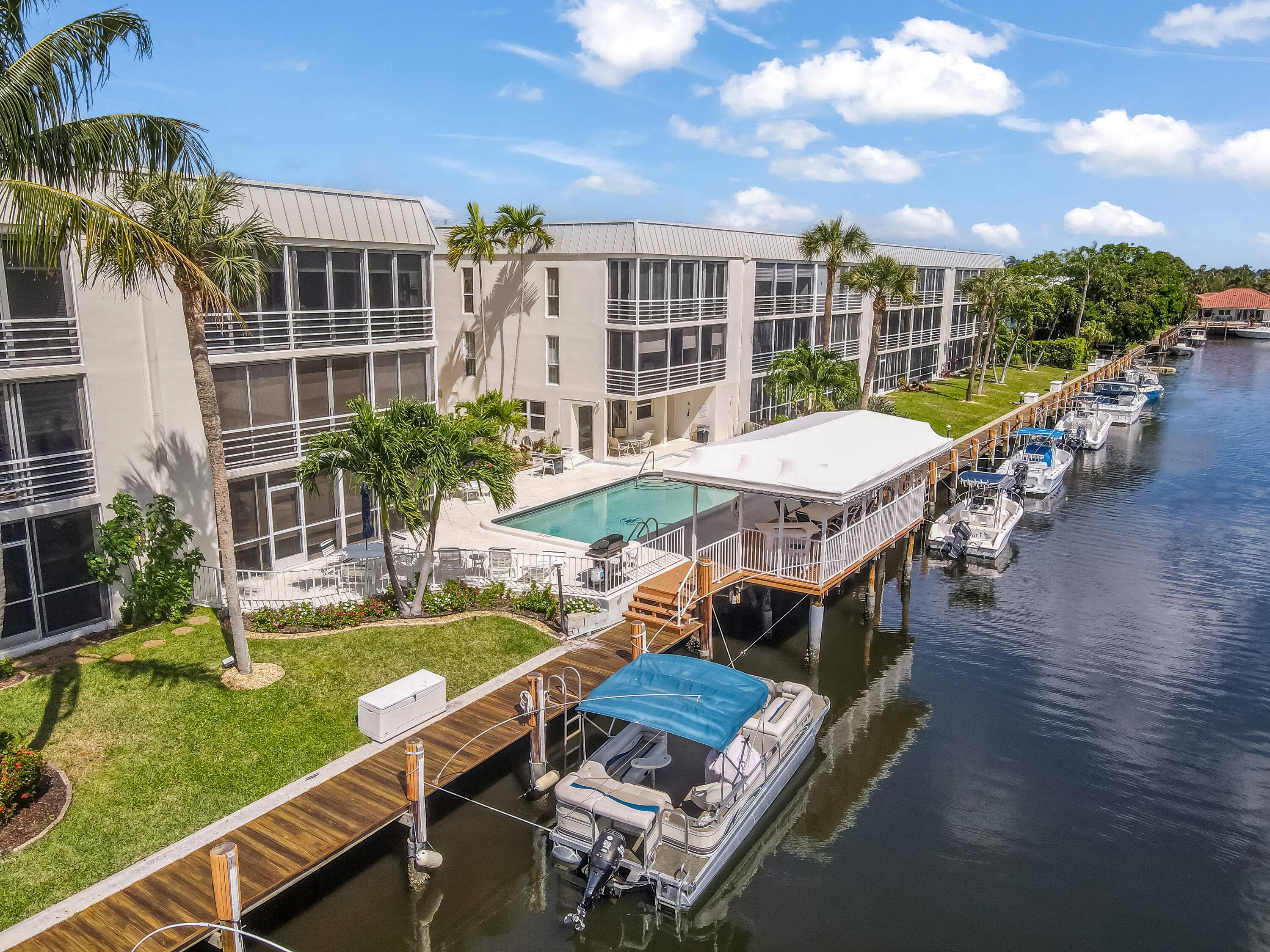 Experience the ultimate waterfront lifestyle in this spacious 2 bed, 2 bath condo in East Boca Raton's exclusive 55 community.