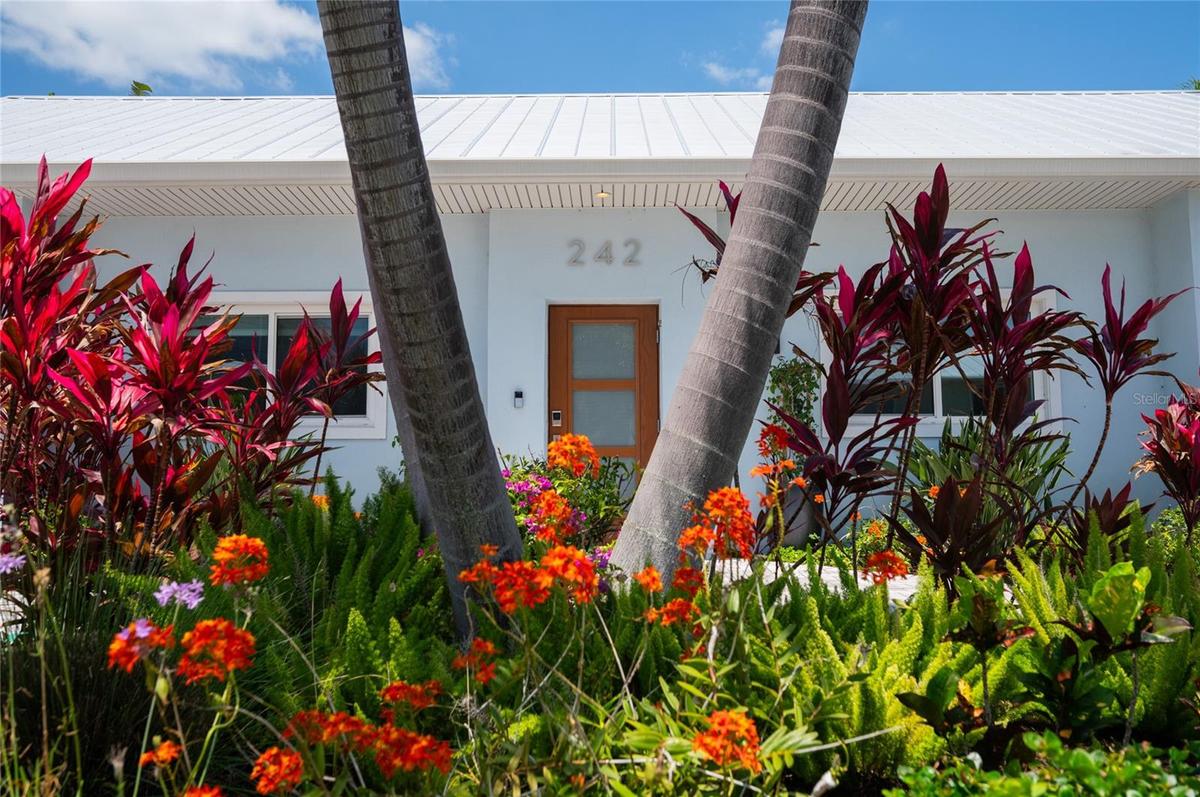 Tropical landscaping with lots of color all around