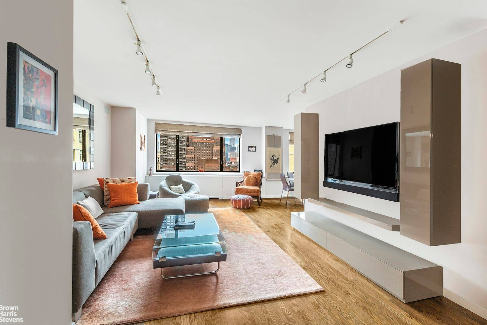 Elegantly renovated two bedroom, two and a half bathroom condominium sitting high in the sky in the heart of Lincoln Square and around the corner from Central Park.