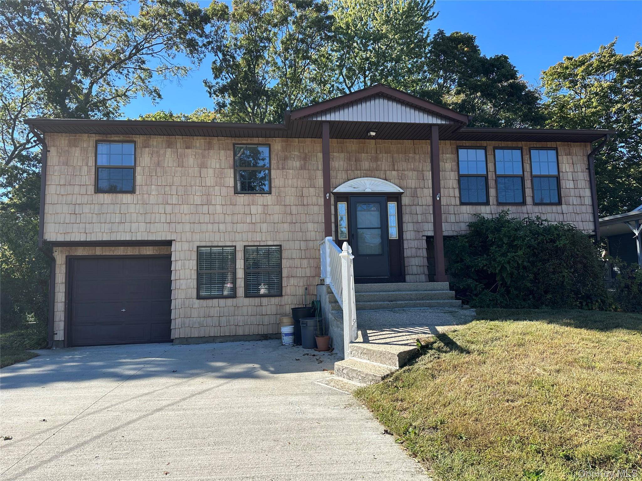 This home features so many possibilities there is a living room with a fireplace, dining room, two kitchens, office, five bedrooms and three baths !