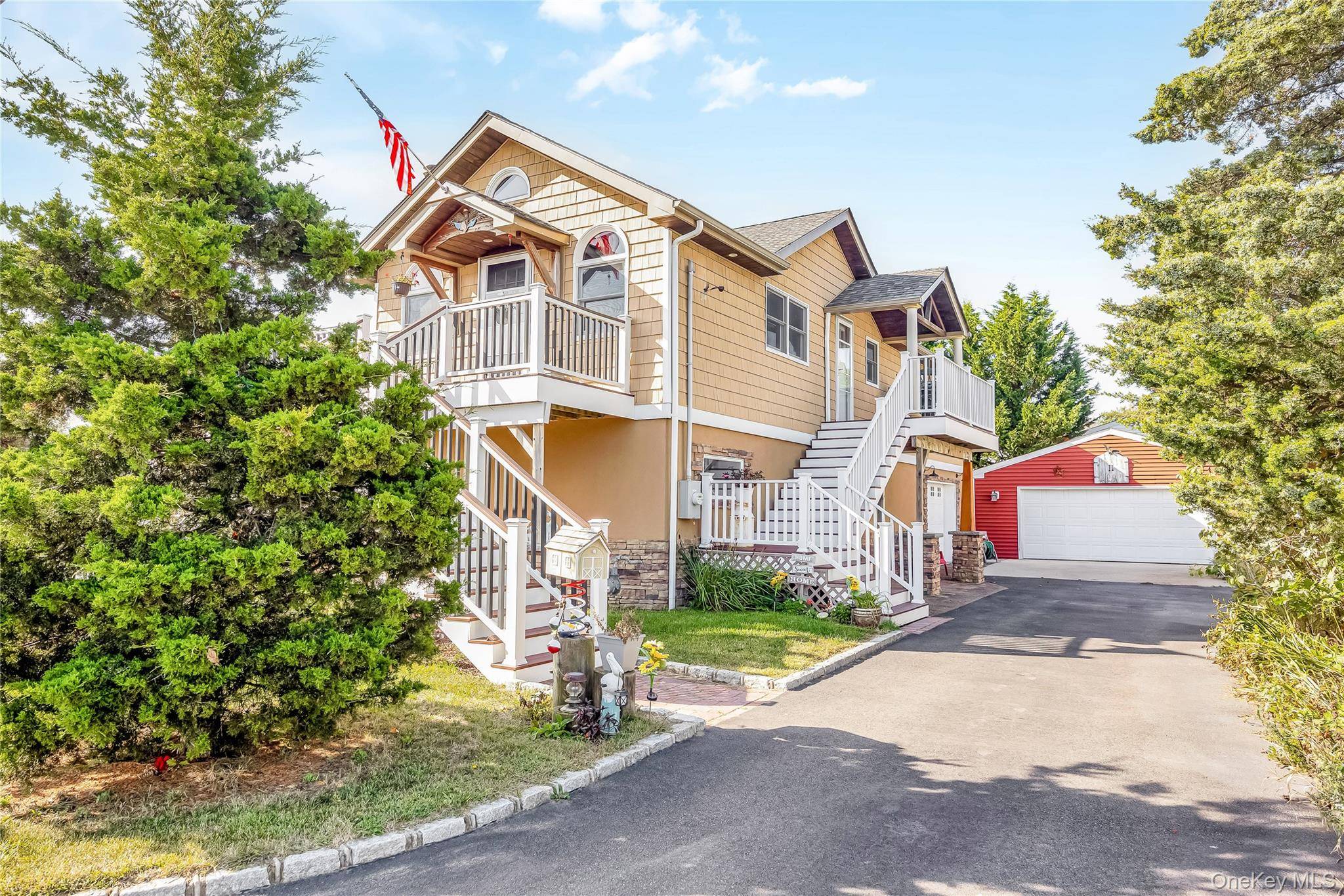 Magnificent Expanded Ranch situated on a quiet block, Incorporated Village, south of Montauk Hwy, entire home redone in 2016, just like a new home.