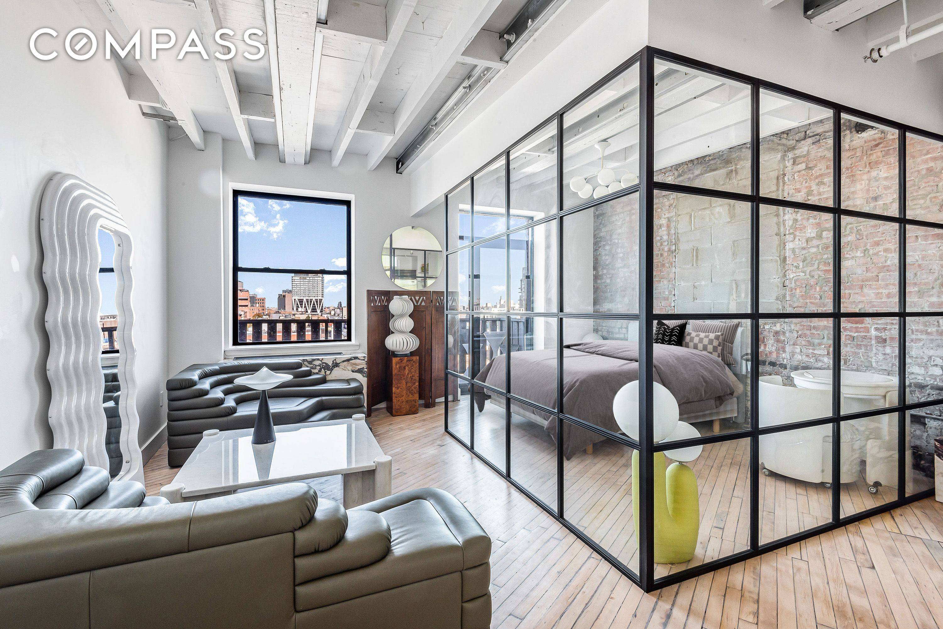 This truly unique studio loft with a large balcony and open views is situated on the top floor of The Mill Building, Williamsburg s premier pre war doorman building.