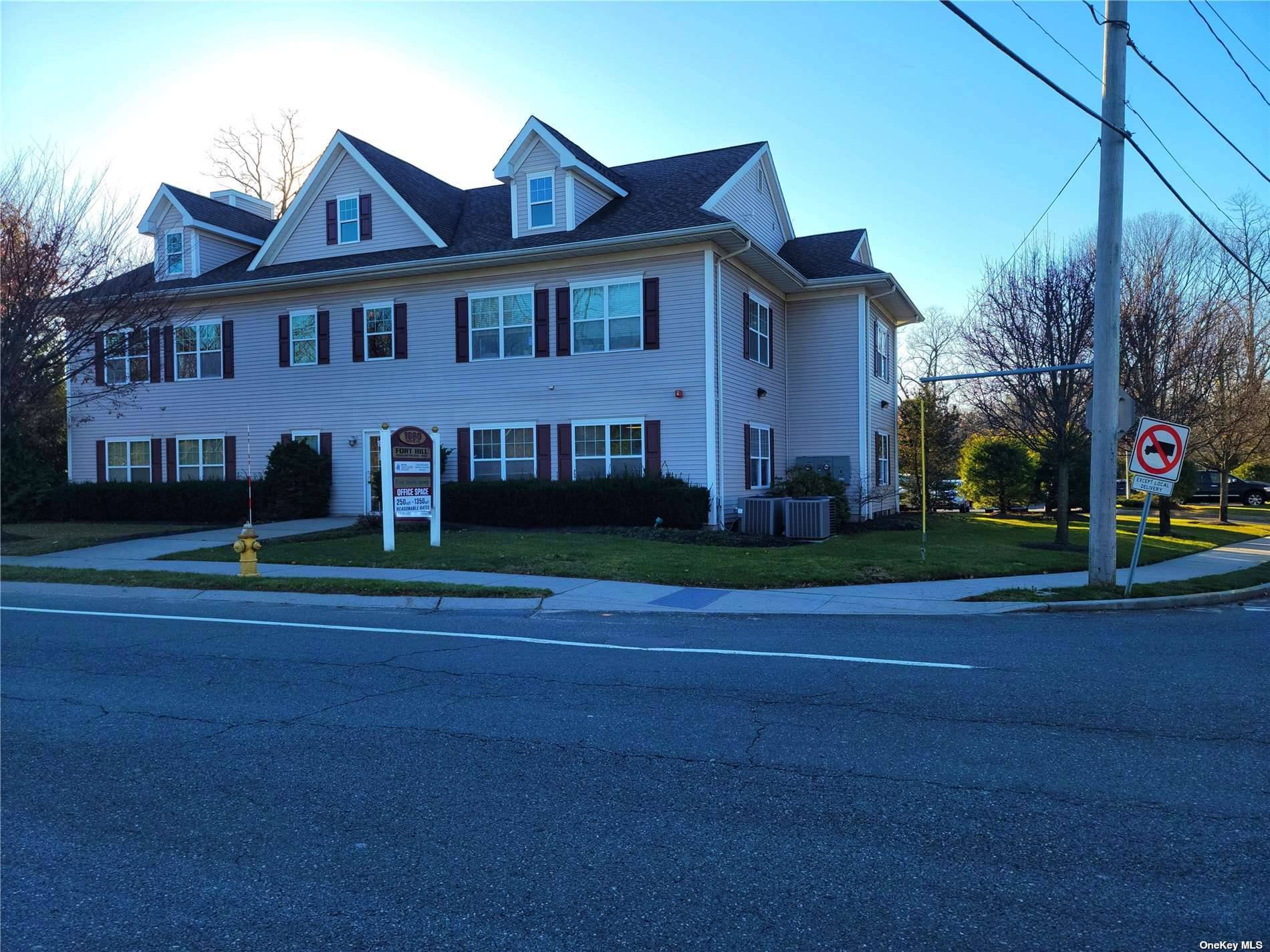 FREESTANDING TWO STORY BUILDING FOR SALE LOCATED ON THE CORNER OF ROUTE 112 AND HAWKINS PATH.
