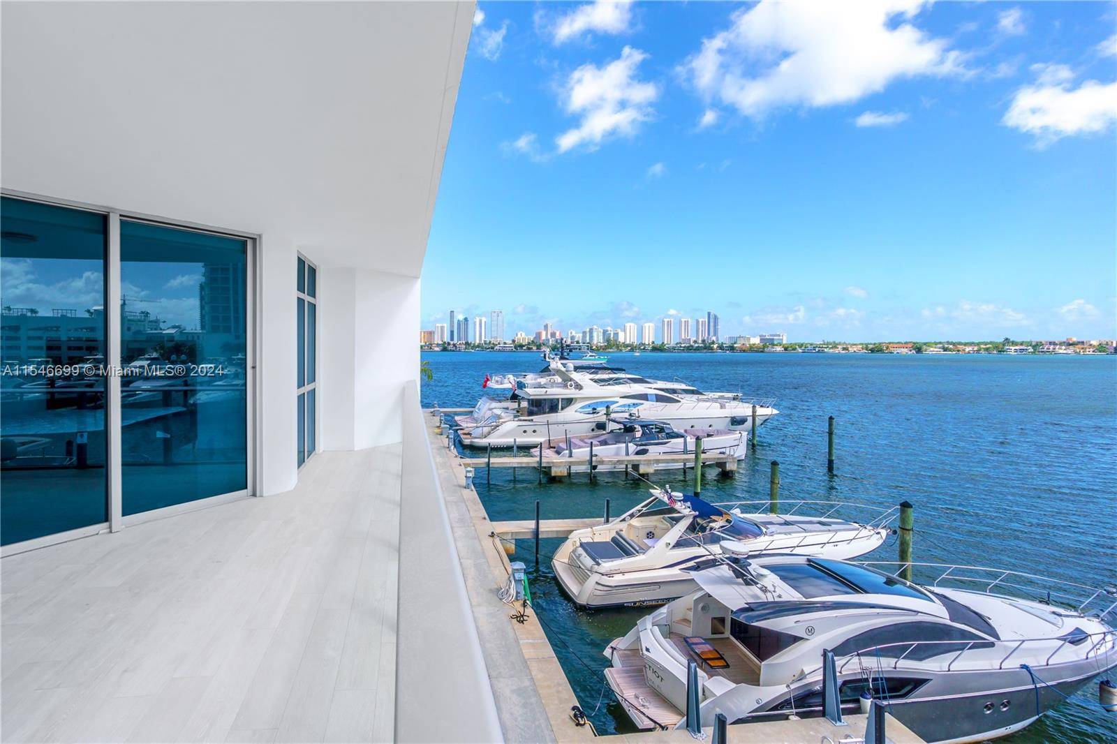 Spectacular water views from every room in this 2 bedroom 2 bathroom condo in a prestigious Marina Palms.