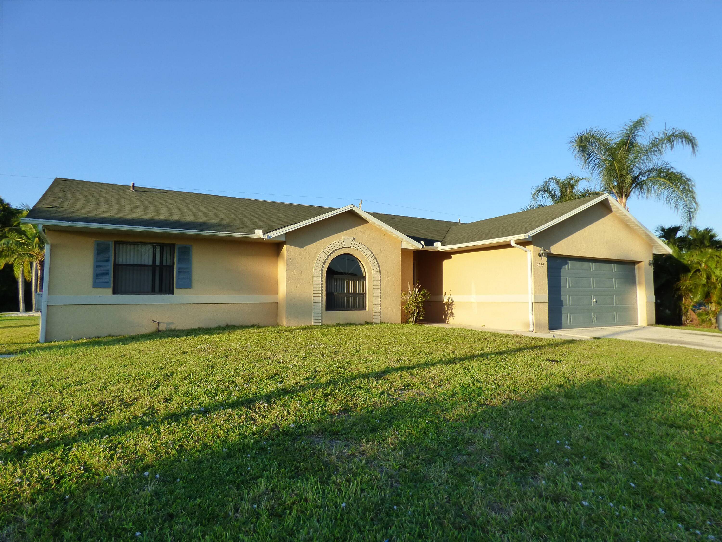 Saint Lucie West Torino Area 3 Bedroom 2 Bath Home 2 Car Garage Spacious Corner Lot Newly Renovated, Tile Floor Throughout, Screened Lanai.