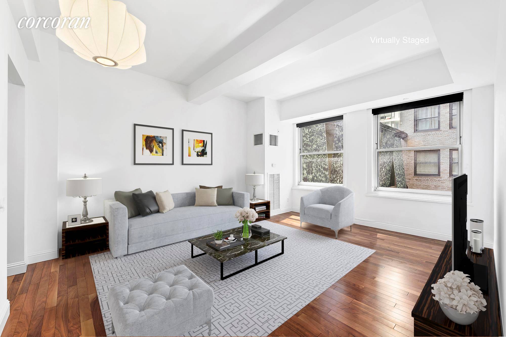 This exceptional Financial District studio with a den lives like a large one bedroom in one of Downtown's most revered, full service condo buildings.