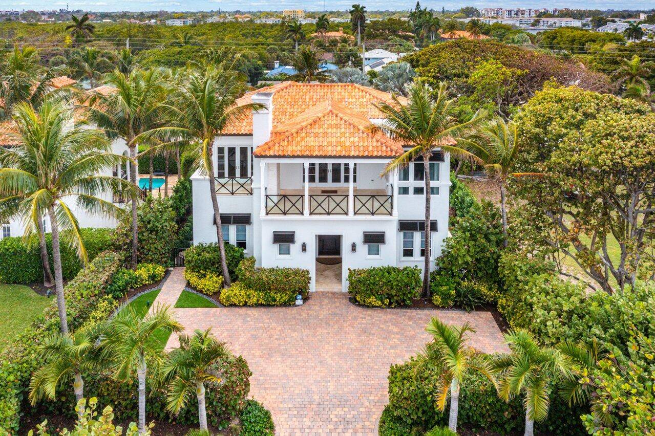 Gorgeous, coastal style estate just steps from the beach in Ocean Ridge.