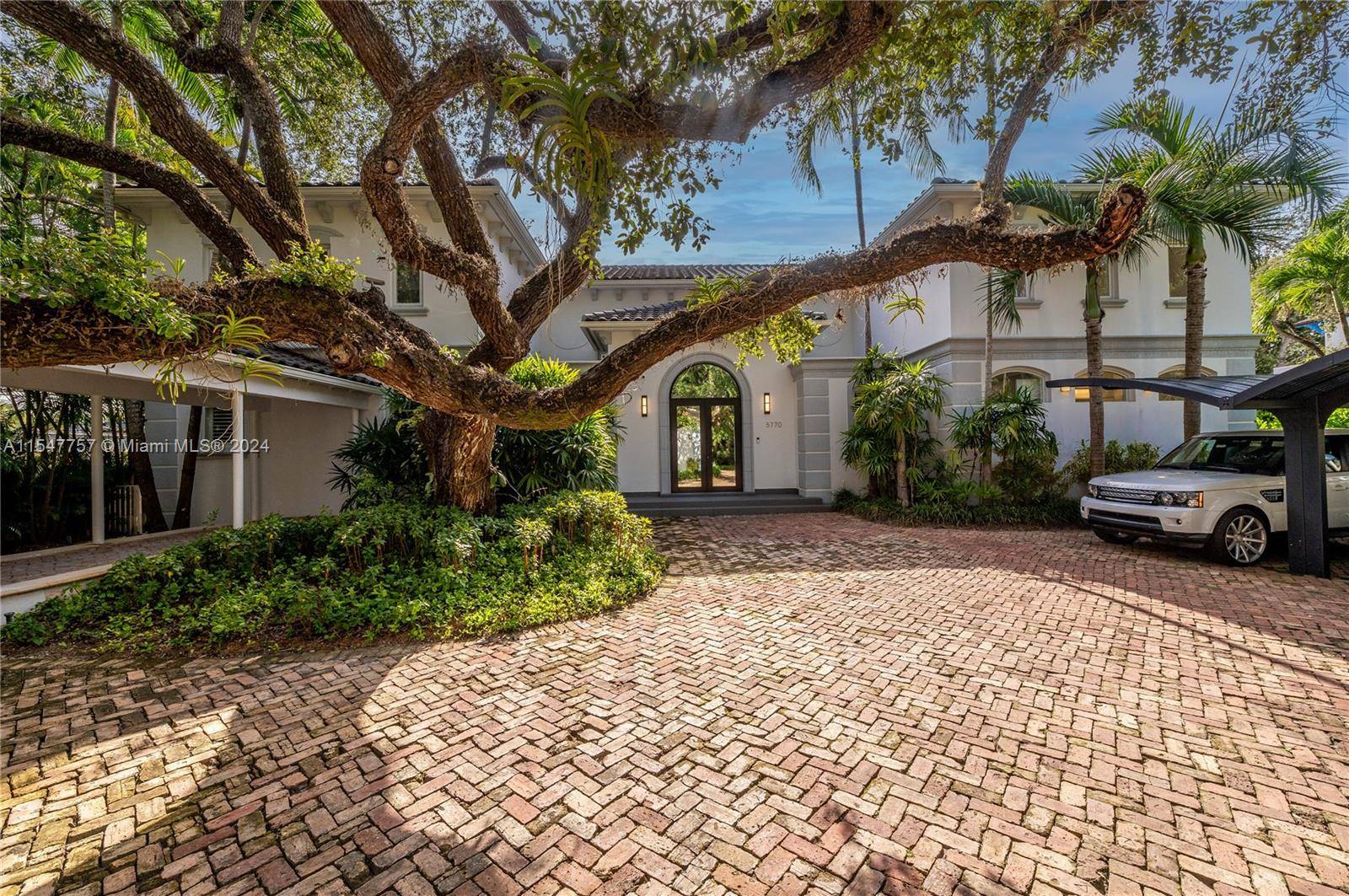 Mediterranean gem, ideally located on a private street, in the beautiful gated community of Palms Estates.