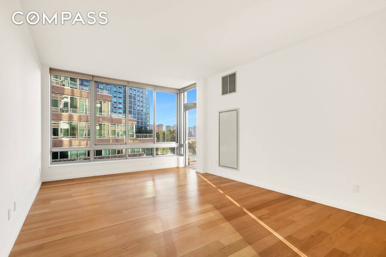 Simply Spectacular ! This sprawling sun drenched extra large one bedroom home with your own private balcony boasts the most amazing city and water views directly from your own living ...