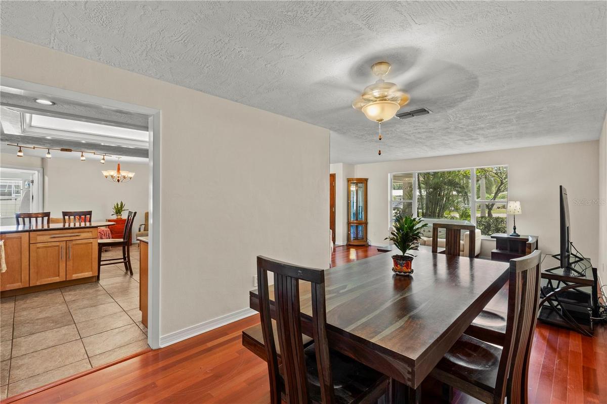 Spacious living and dining area featuring an open-concept design, abundant natural light, and seamless flow between spaces—perfect for both everyday l