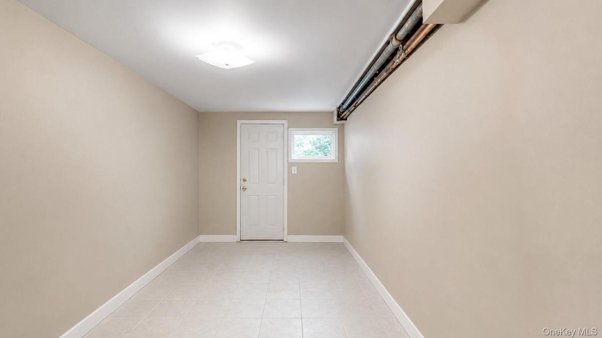 *virtual clearing* Rear entry basement.