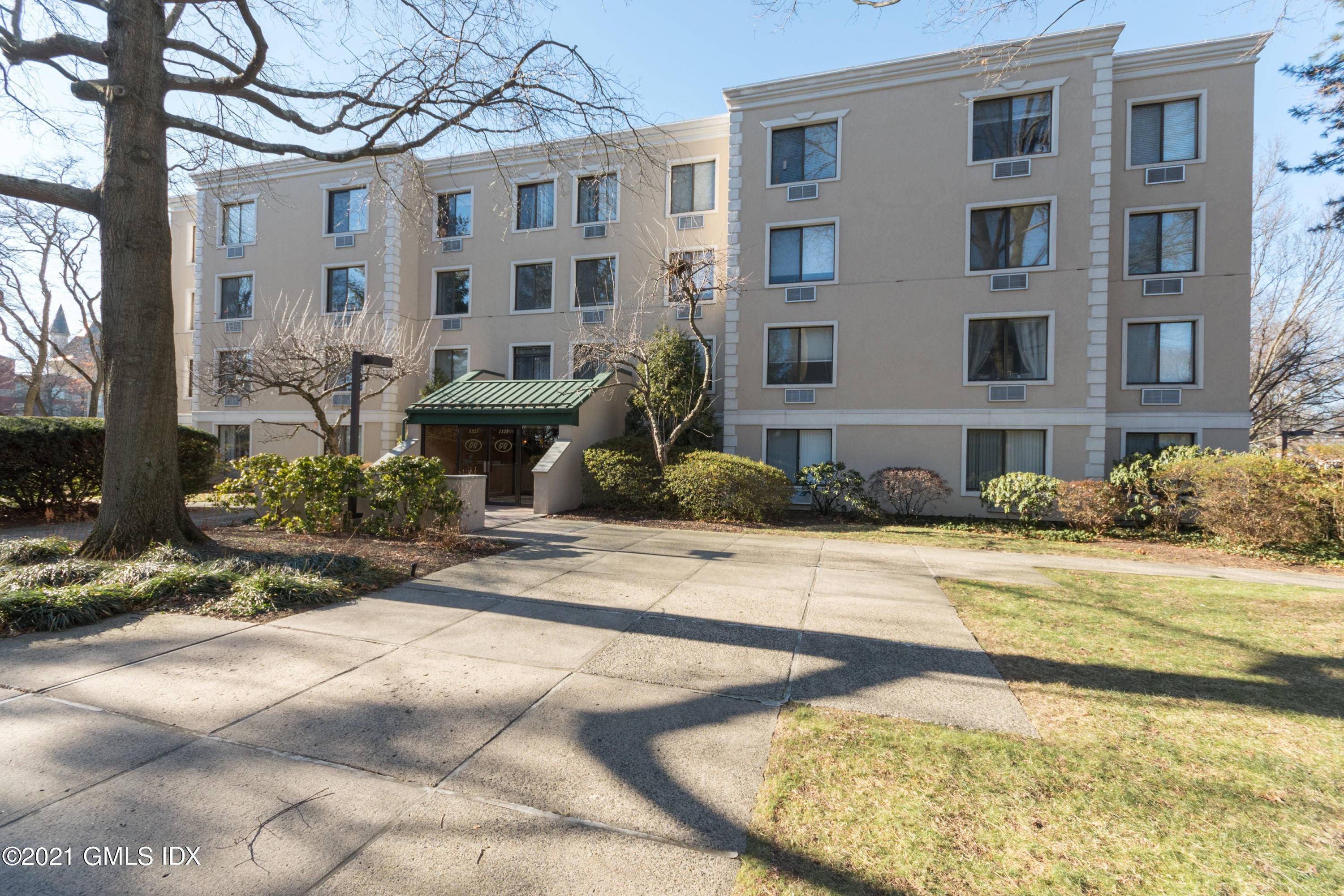 SUN POURS INTO THIS NEWLY RENOVATED AND IMMACULATE TWO BEDROOM, CORNER UNIT CONDO IN OLD GREENWICH !