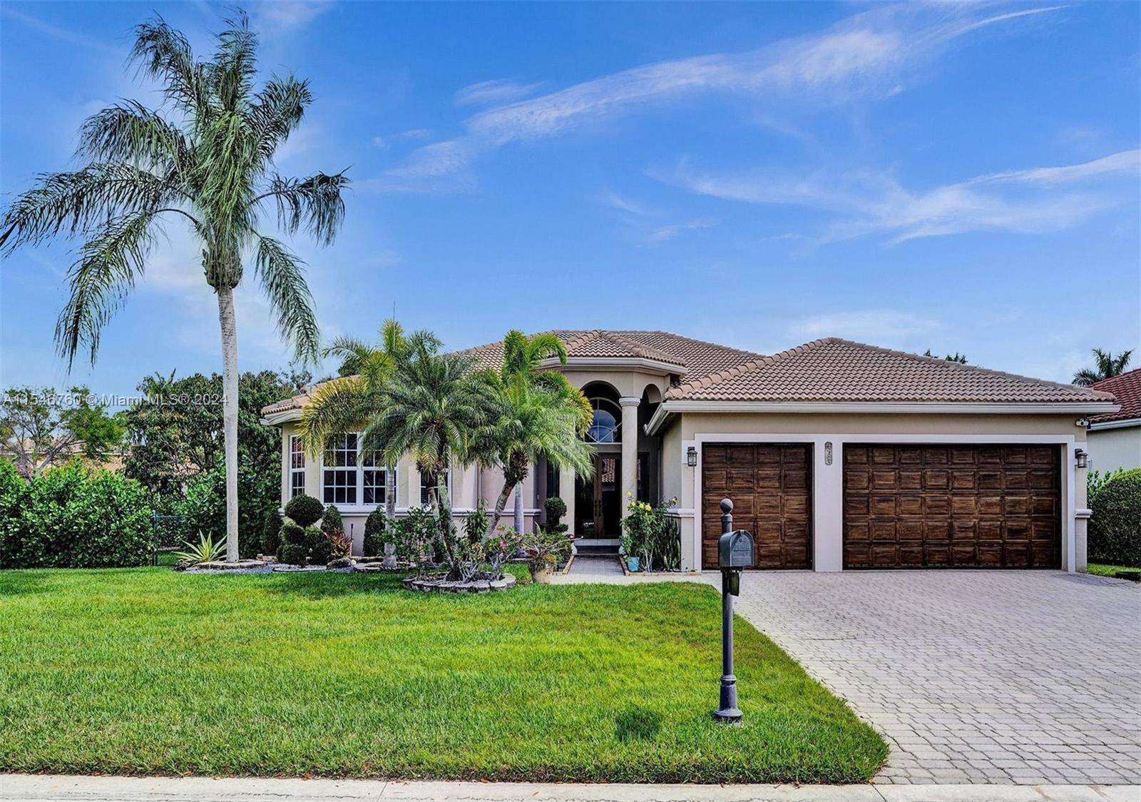 New Improved Price Breathtaking Rarely Available Single Story Corner Home with 5 Bedrooms, 3 ½ Baths, 3 Car Garage and a Screened Pool Oasis, in the Sought After Gated Community ...