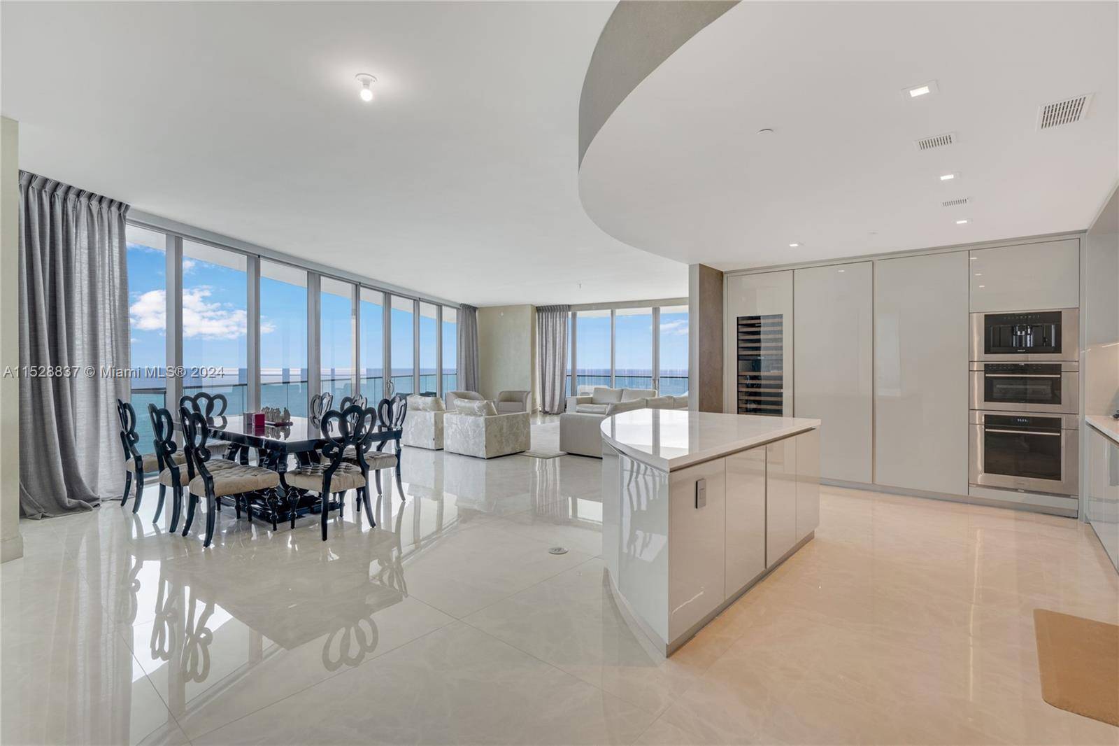 Step into Paradise, with this gorgeous wrap around with terraces from every room enjoy endless coastline views, looking southeast downtown, and northeast towards ft lauderdale, Move in ready only needed ...