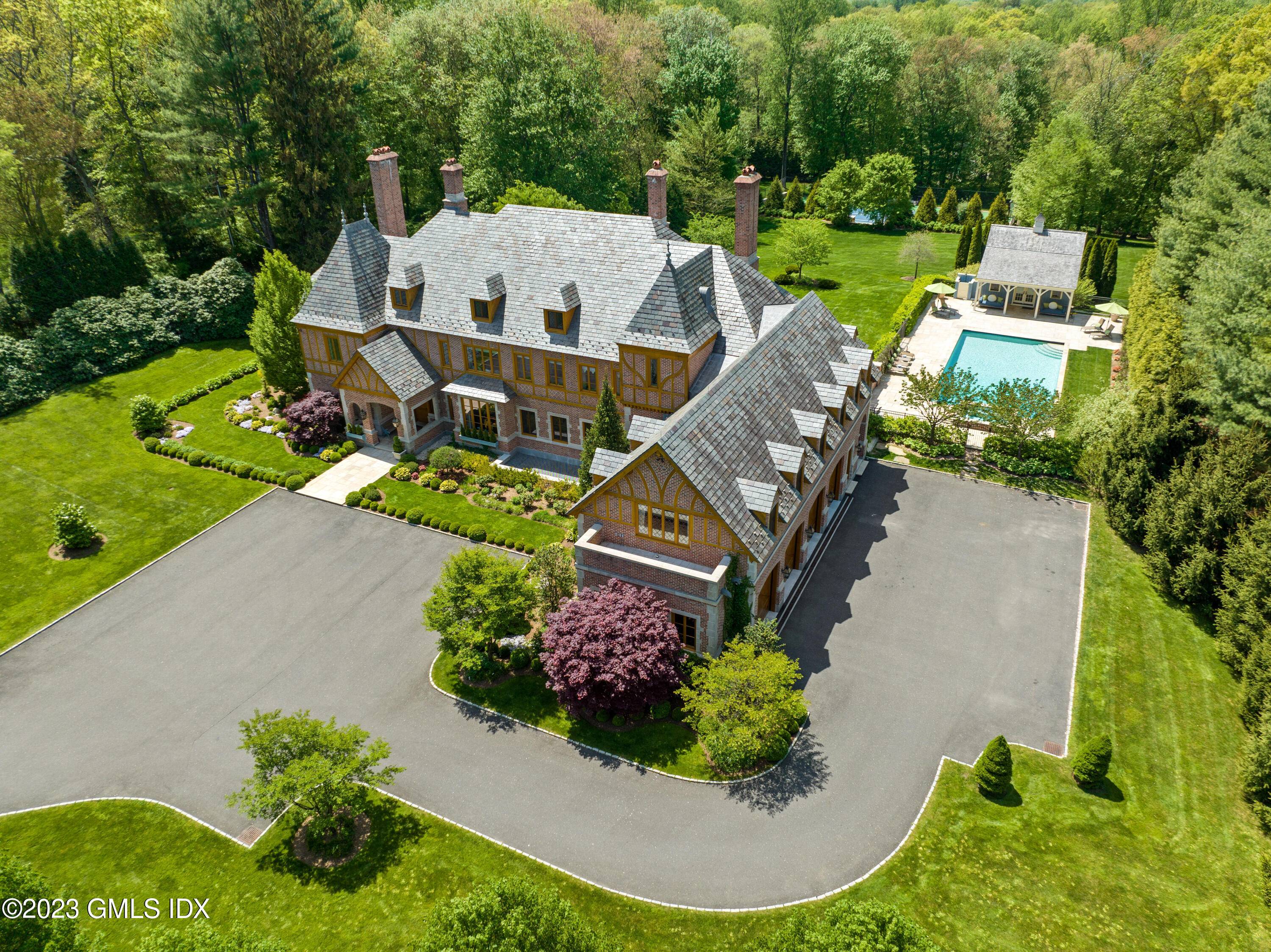 Prepare to be captivated by this masterfully crafted 8 brm French Normandy Estate.