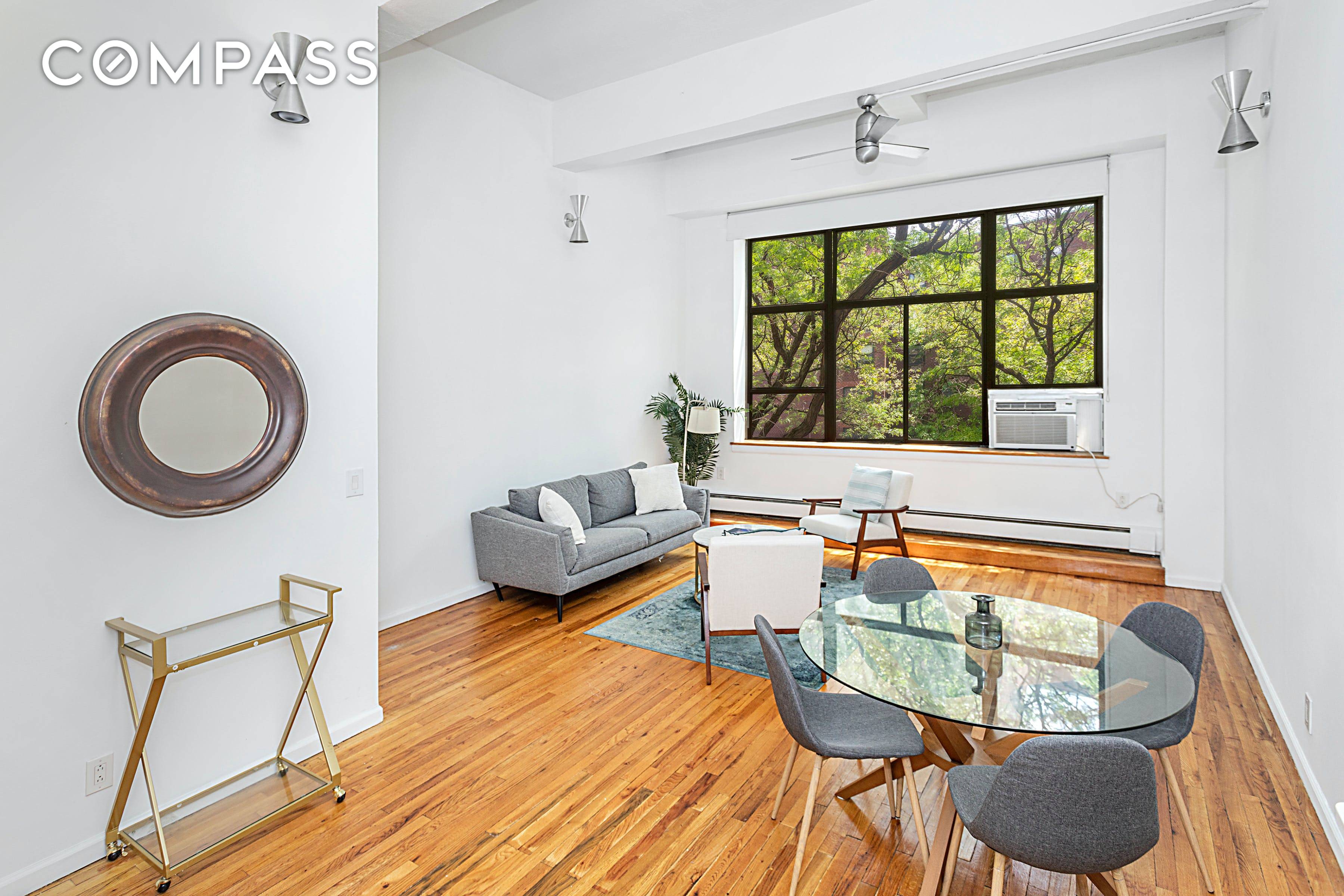 Looking for a charming loft with soaring high ceilings flooded with natural light ?