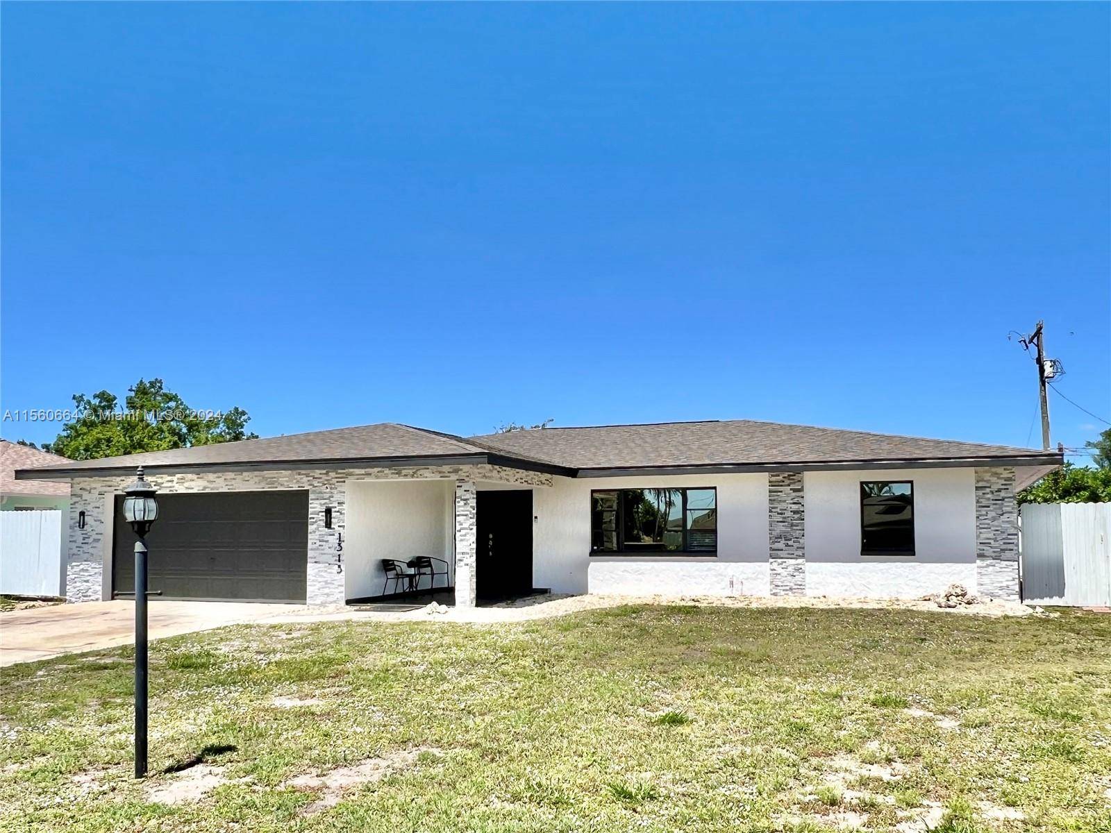 Nestled in the heart of Cape Coral, this updated 3 bedroom, 2 bathroom home with a 2 car garage offers a blend of style and functionality with a private in ...