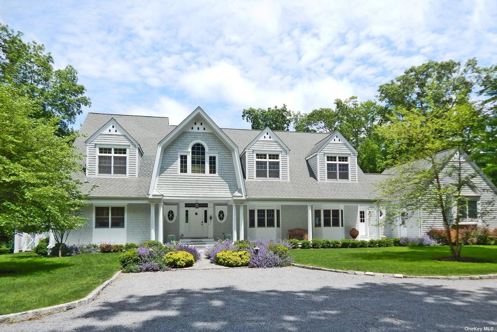 Divinely appointed, this beautiful, custom traditional home is located in the coveted waterfront community of West Banks, North Haven.
