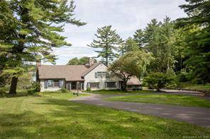 Lake Wononscopomuc Family Compound The elegant gated driveway leading down to the stunningly renovated shingle style home designed by the noted architect Ralph Twitchell in 1930 sits majestically on 333 ...