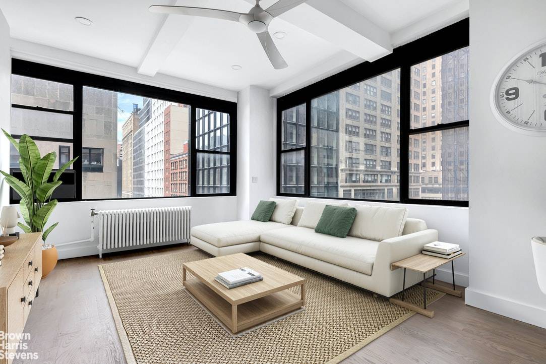 Condo 4A is a quiet oversized corner loft with 10 ft beamed ceilings and an abundance of large windows.