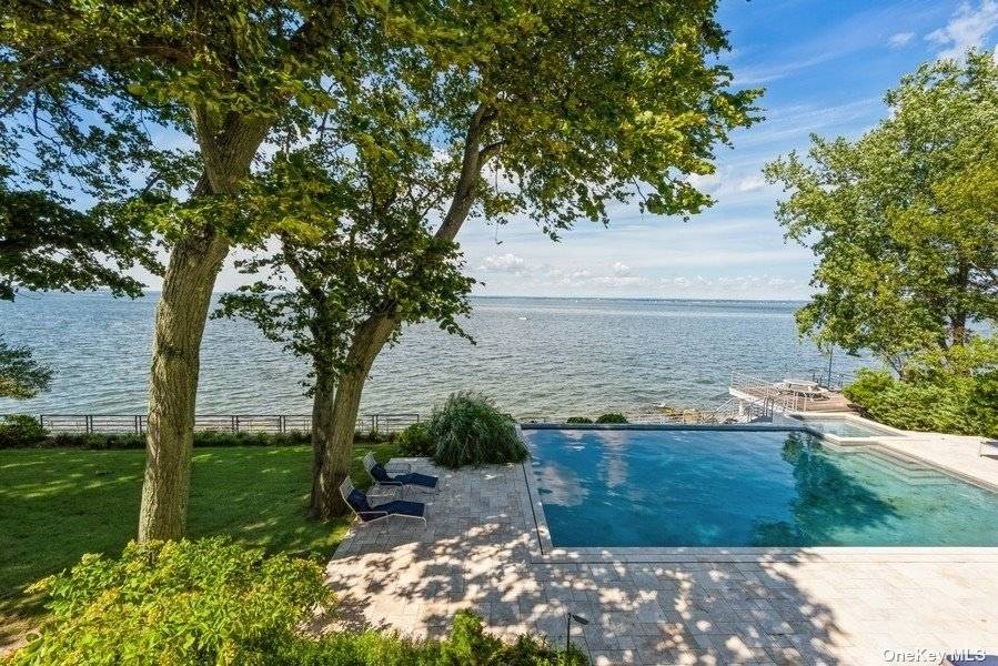 Come see this Breathtaking Custom built WATERFRONT home, situated in the prestigious Morgan's Island with views of NYC.