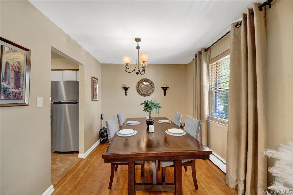Dining area with original hardwood floor