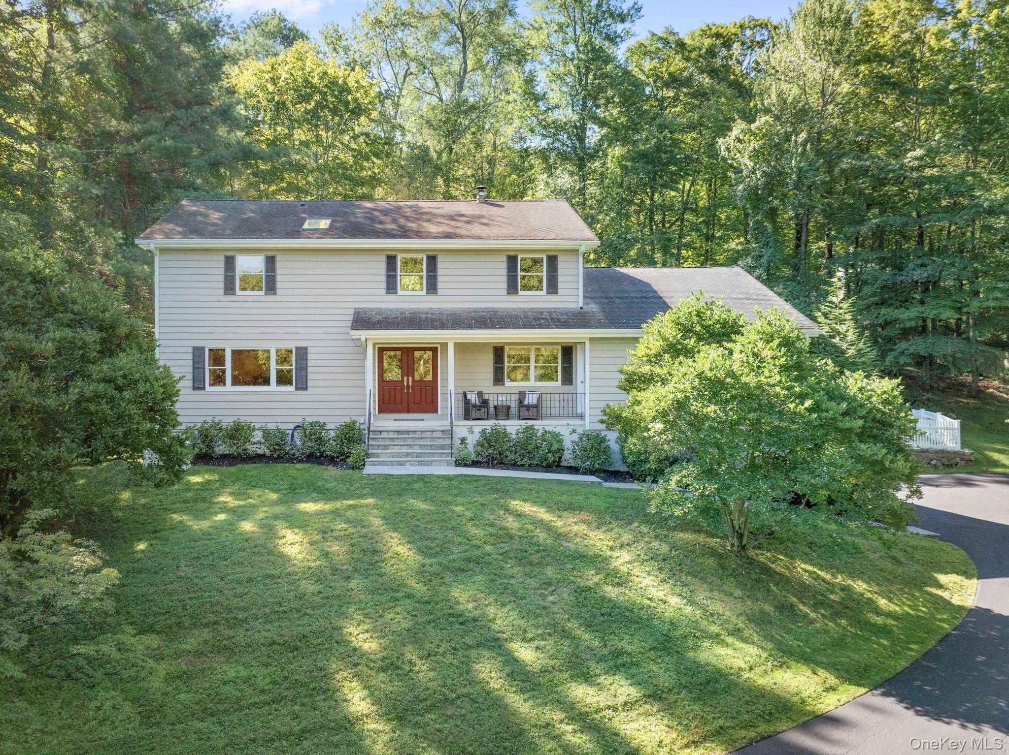 Timeless elegance meets modern comfort in this beautifully updated Colonial home.