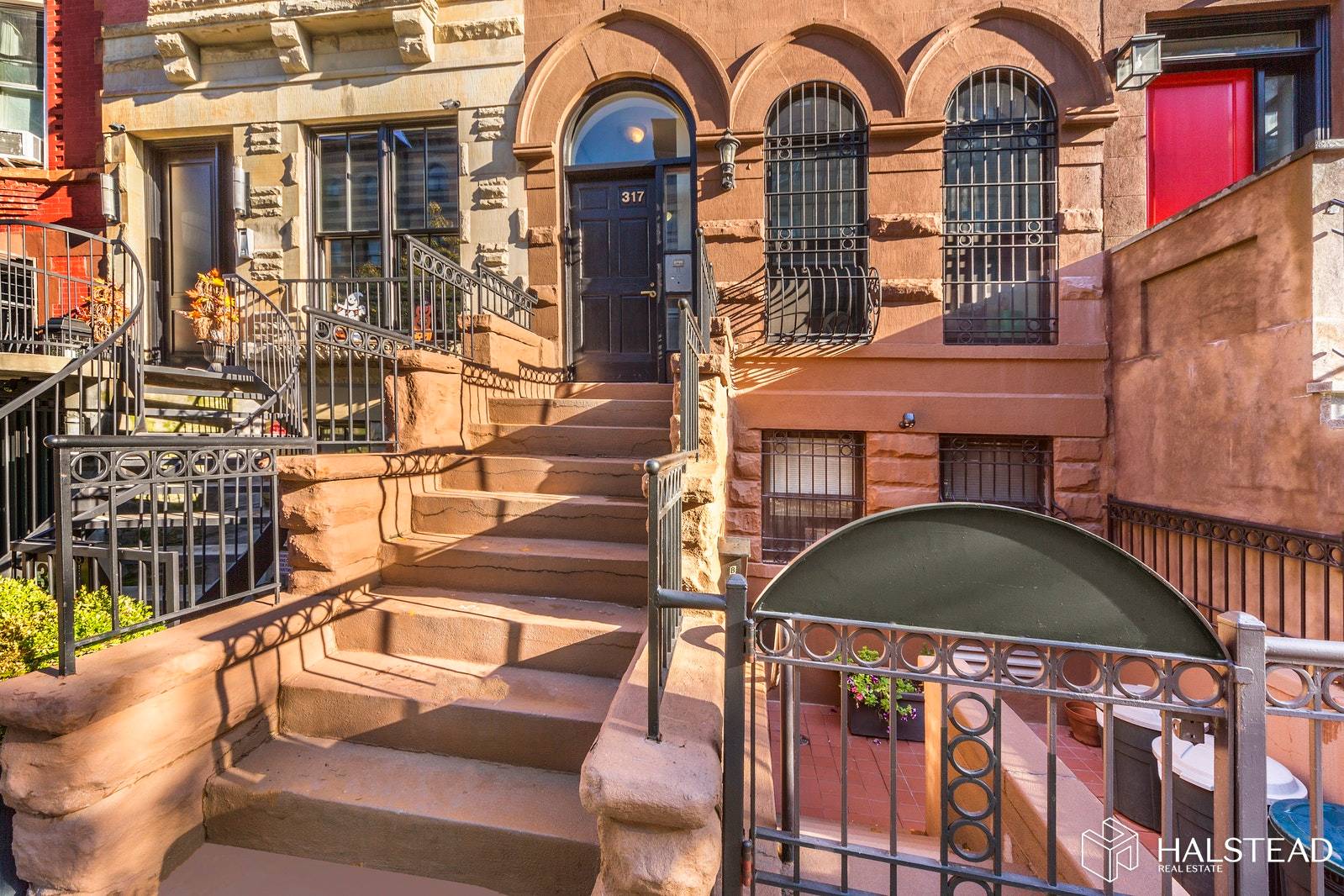 This South Harlem brownstone on 112th Street is located on one of the finest blocks in Harlem.