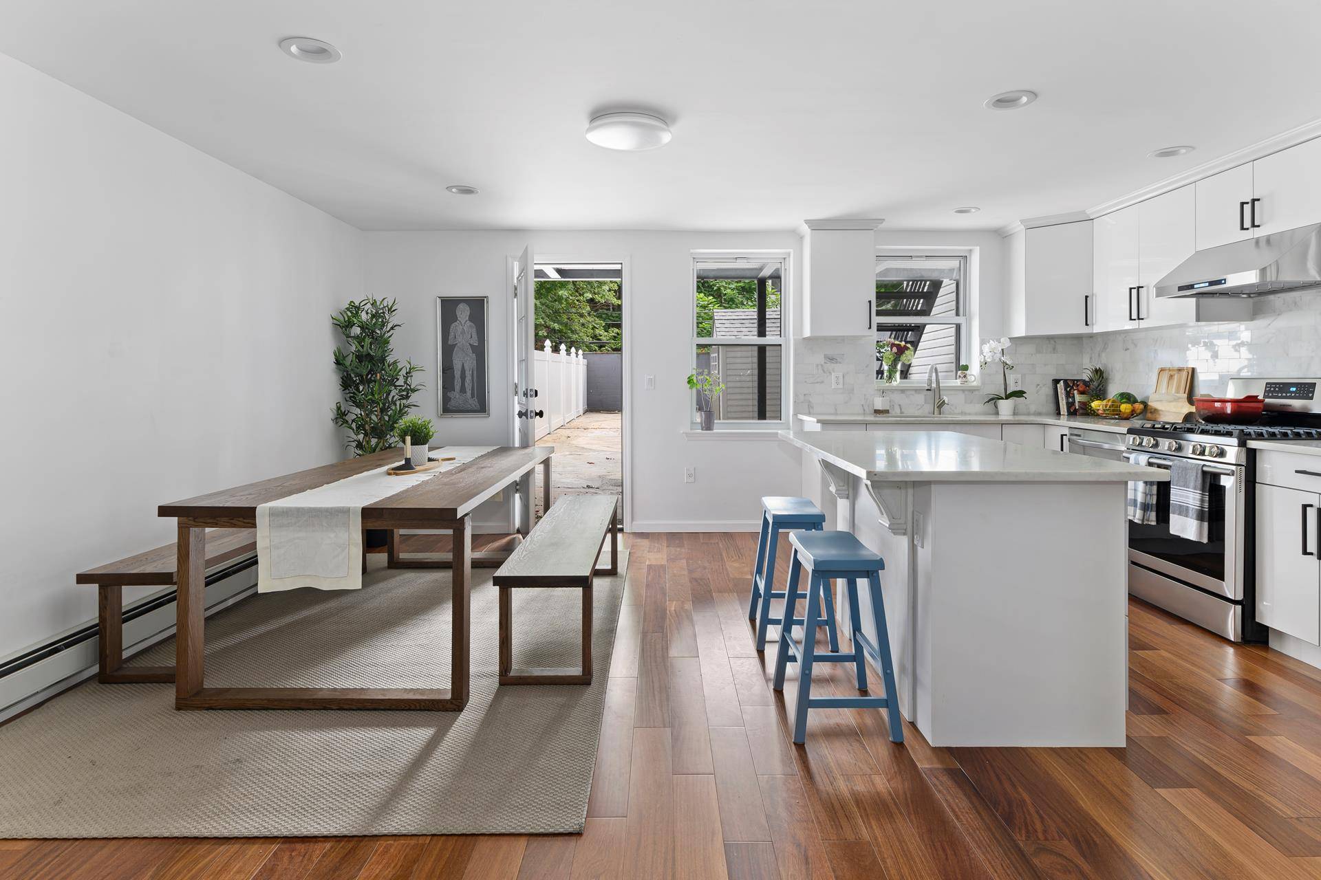 This beautifully gut renovated two family home features premium finishes and two outdoor spaces on a charming Brooklyn block.
