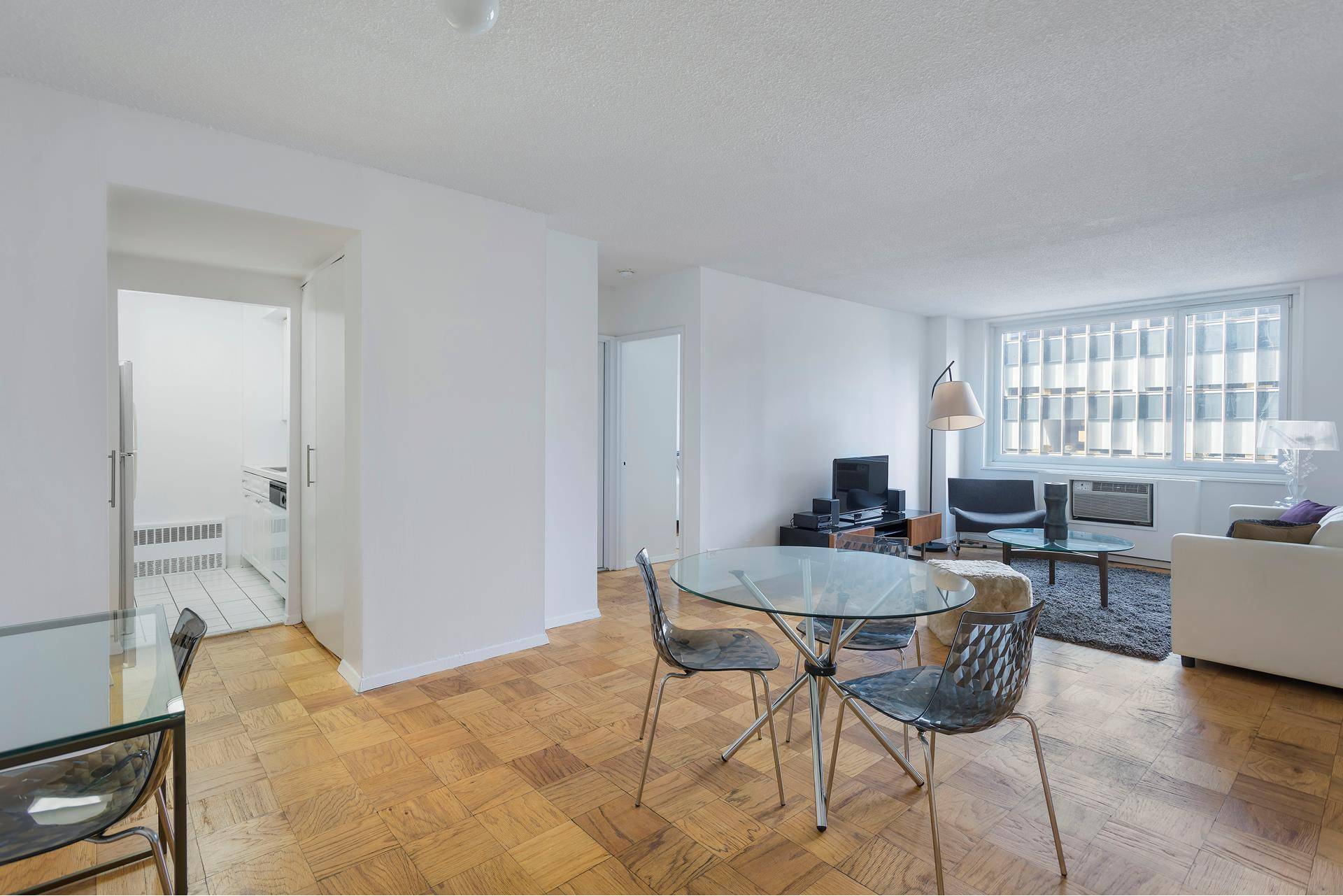 Spacious one bedroom one bathroom West facing apartment located in full service luxury building in Midtown West.