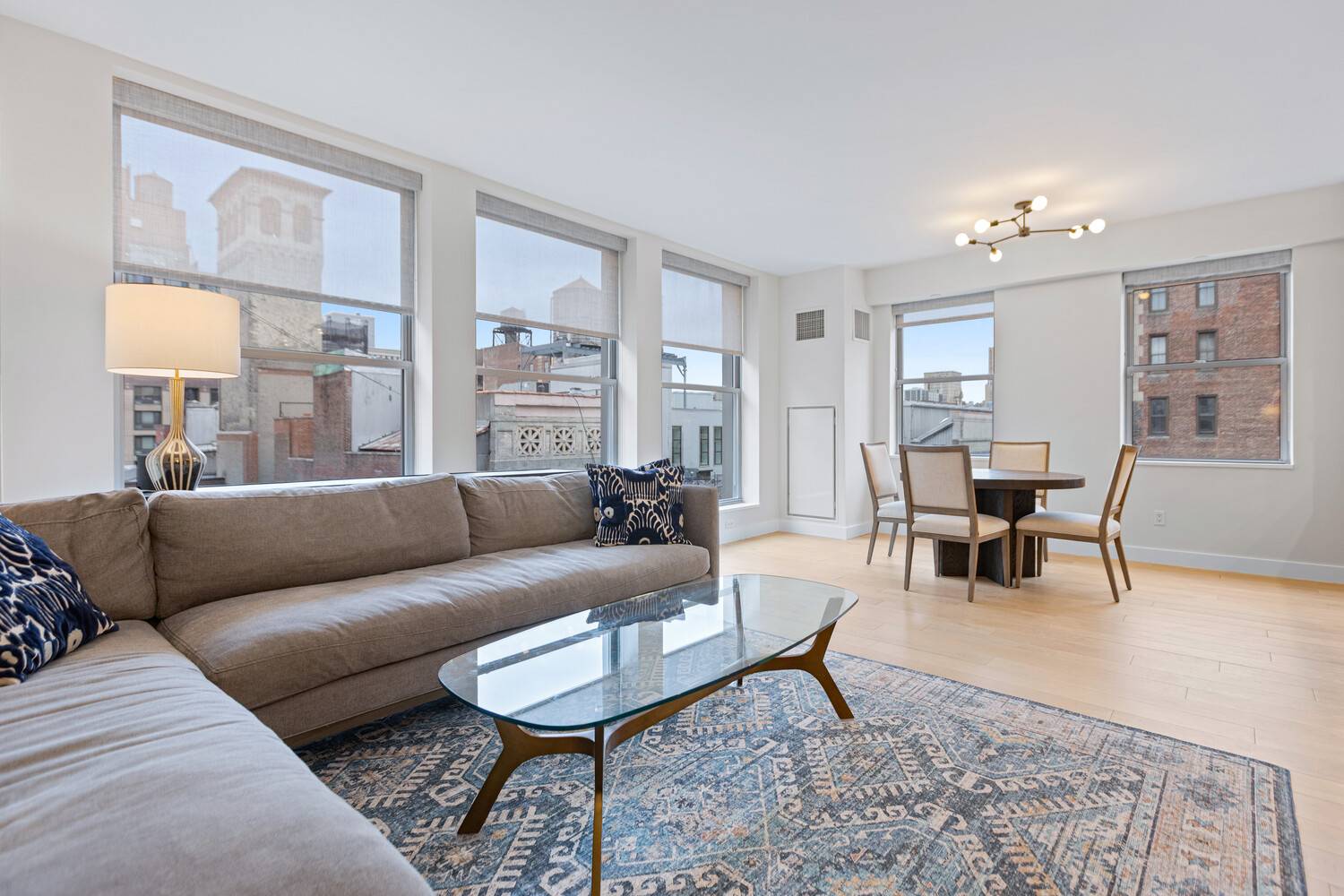 Perched on the 12th floor of a boutique Flatiron condominium, this immaculately renovated 2 bedroom, 2 bath residence offers three sunny exposures, a private keyed elevator entrance and central A ...