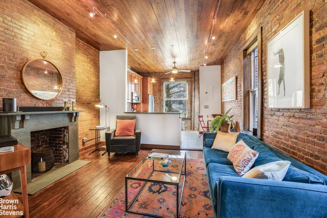 LOFT STYLE DUPLEX WITH PARKING AND SHARED OUTDOOR SPACE Uniquely charming pre war 2 bed 2 bath loft style duplex with 8 windows on 3 sides providing lovely light and ...