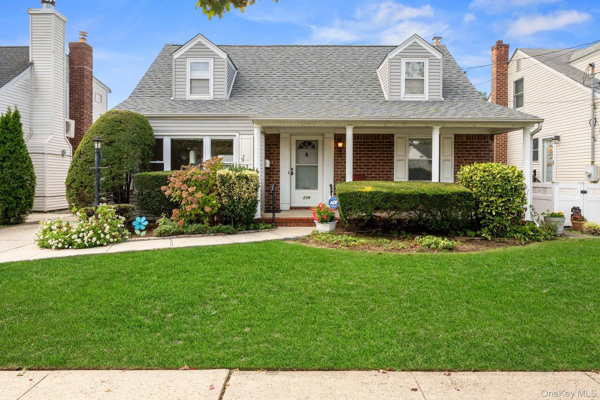 Lovely 4 Bedroom, 2 Bath Wide Line Cape with Great Bones and Terrific Curb Appeal Welcome to this charming and well maintained home ideally situated mid block.
